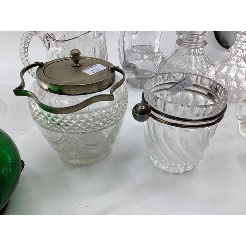 281 - A quantity of glasswares to include decanters, jugs, ice buckets etc