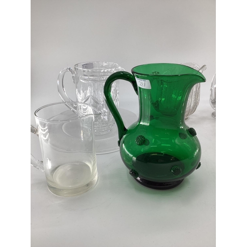 281 - A quantity of glasswares to include decanters, jugs, ice buckets etc