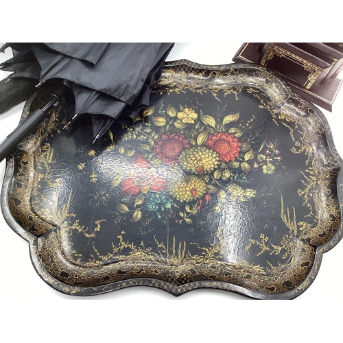 285 - A good papiere mache floral decorated tray, a fur hat,  quantity of umbrellas, old brief cases, and ... 