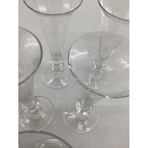 295 - William Yeoward 12 champagne glasses, (and 4 further glasses with chip);