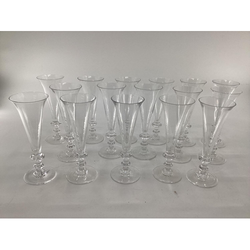 295 - William Yeoward 12 champagne glasses, (and 4 further glasses with chip);