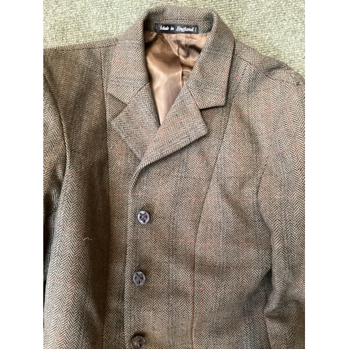 309 - vintage clothing to include a fur coat , hunting coats  etc