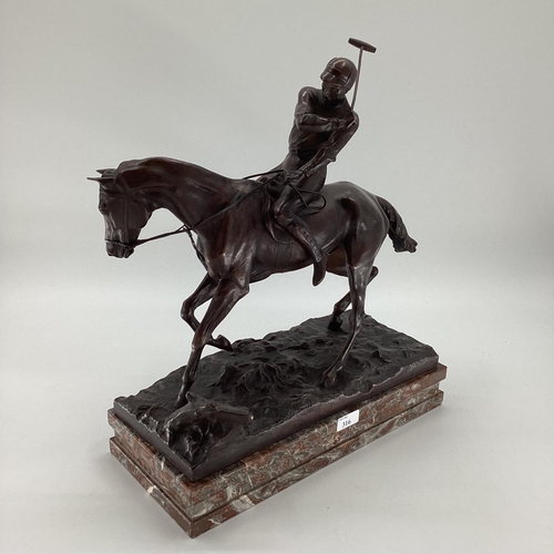 316 - JOSEPH CUVELIER (1833-1870) A patinated bronze figure of a polo player c 1866, mounted on a marble b... 