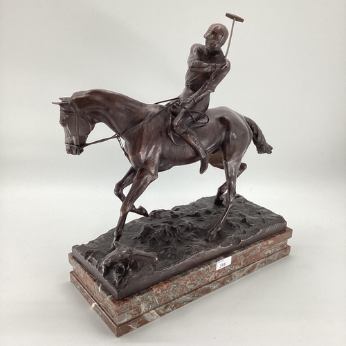 316 - JOSEPH CUVELIER (1833-1870) A patinated bronze figure of a polo player c 1866, mounted on a marble b... 