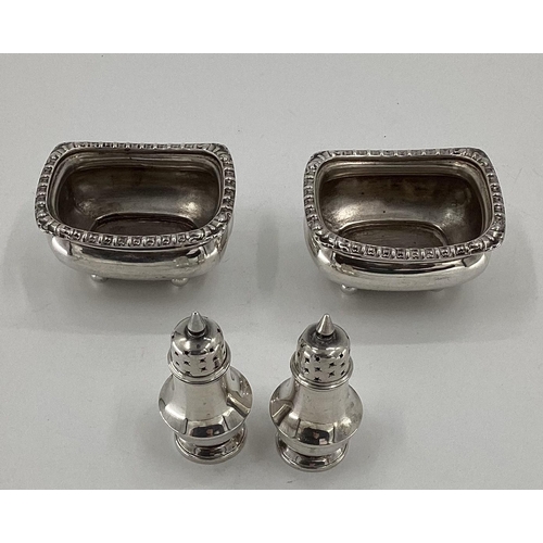 35 - A sterling silver and cut glass hip flask by Mappin & Webb Sheffield 1899; A pair of sterling silver... 