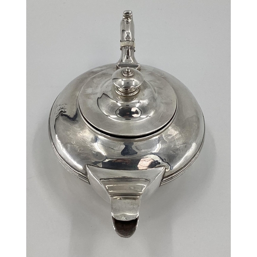 36 - A Georgian silver coffee pot of squat bulbous form, by Rebecca Emes and Edward Barnard I London, 182... 