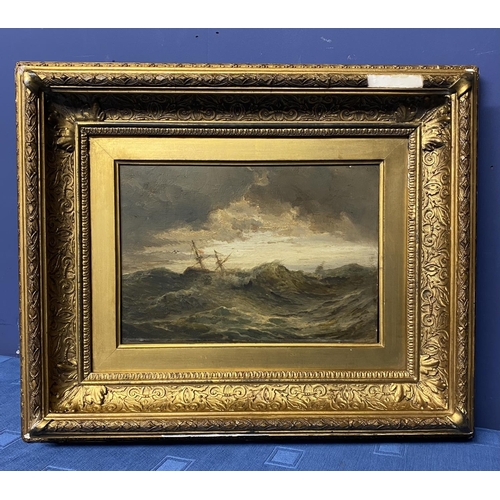 403 - A C19th oil on board of a ship in stormy seas, in a gilt frame (unsigned) 17 cm x 24 cm for the actu... 