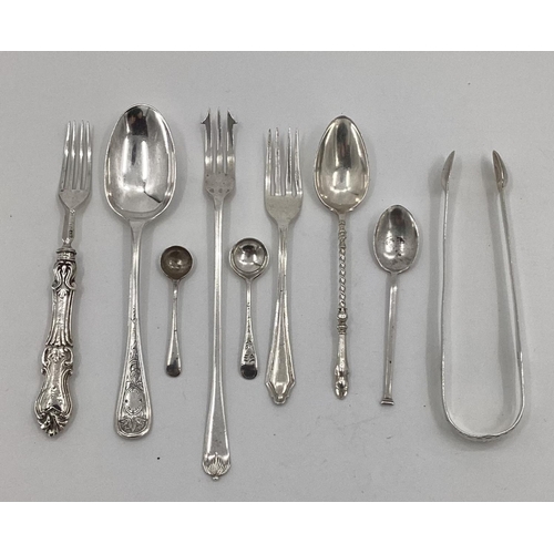 41 - A collection of sterling silver and white metal items to include sugar tongs, pickle fork etc, 170; ... 