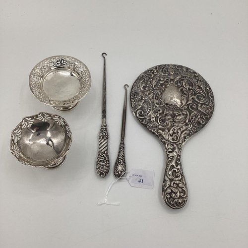 41 - A collection of sterling silver and white metal items to include sugar tongs, pickle fork etc, 170; ... 