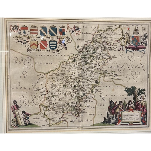 415 - A framed double sided hand coloured map of Northamptonshire with framed glazed text verso with one o... 