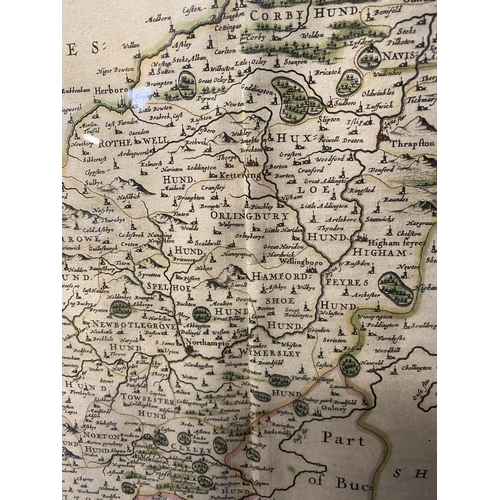 415 - A framed double sided hand coloured map of Northamptonshire with framed glazed text verso with one o... 