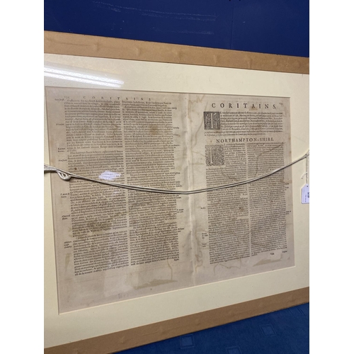 415 - A framed double sided hand coloured map of Northamptonshire with framed glazed text verso with one o... 