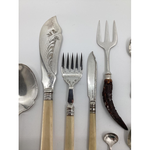 42 - A collection of unmarked white metal and silver plated items to include fish sauce pickle fork etc