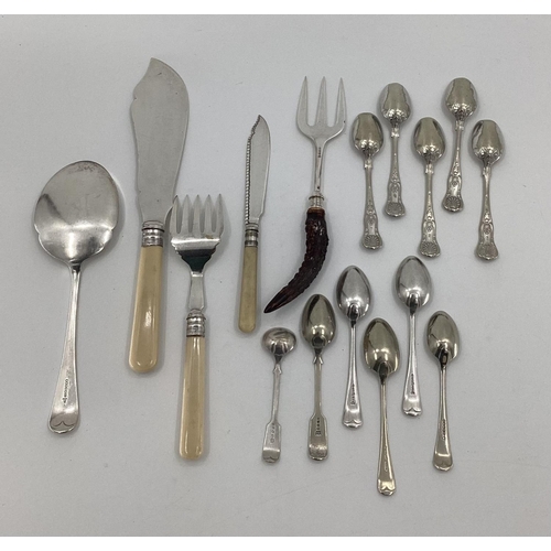 42 - A collection of unmarked white metal and silver plated items to include fish sauce pickle fork etc