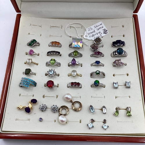 44 - 23 boxed silver and mixed stone jewellery rings etc