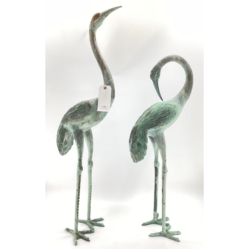 482 - A pair of decorative Verdigris metal cranes, tallest 108cmH