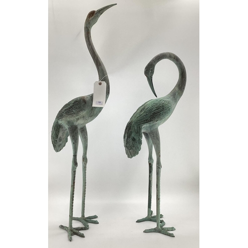 482 - A pair of decorative Verdigris metal cranes, tallest 108cmH