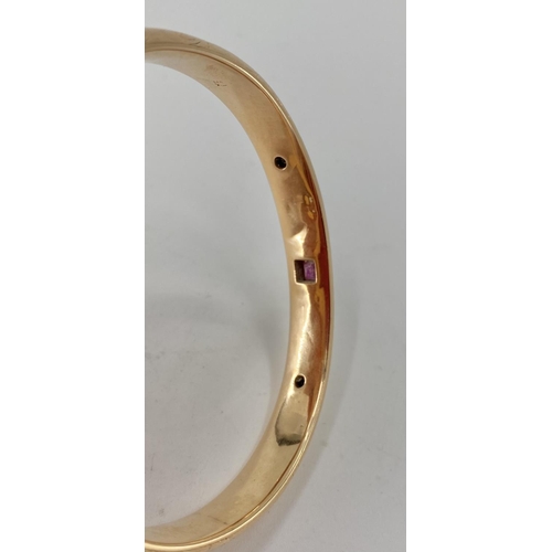 49 - A 14k gold bangle bracelet 16.2 g (not marked)