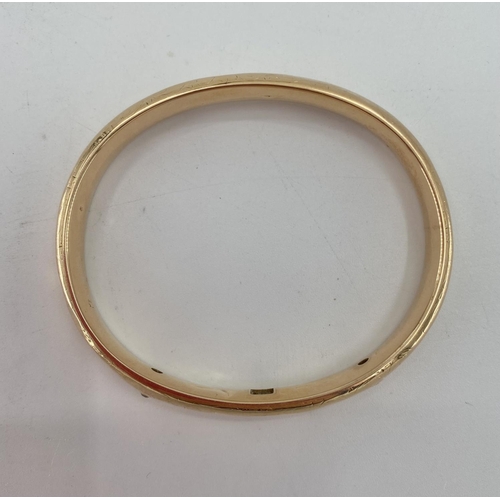 49 - A 14k gold bangle bracelet 16.2 g (not marked)