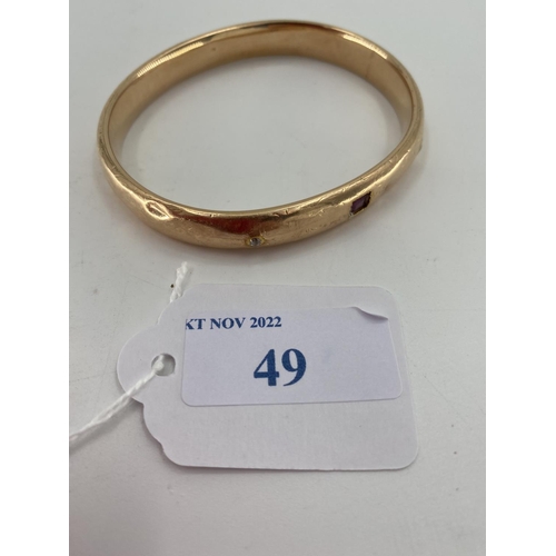 49 - A 14k gold bangle bracelet 16.2 g (not marked)