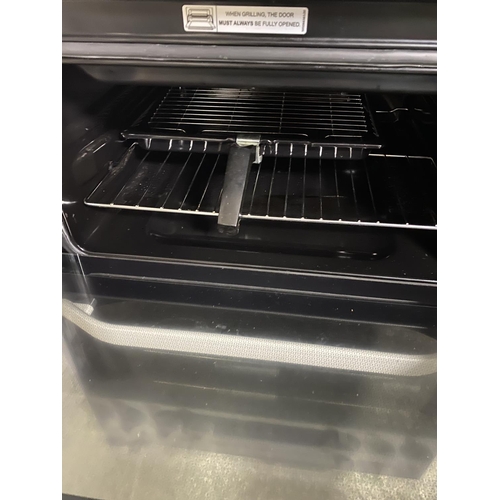 501 - Hotpoint cooker, with paperwork (auctioneer cannot guarantee working order of this lot, it is from a... 