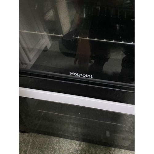 501 - Hotpoint cooker, with paperwork (auctioneer cannot guarantee working order of this lot, it is from a... 