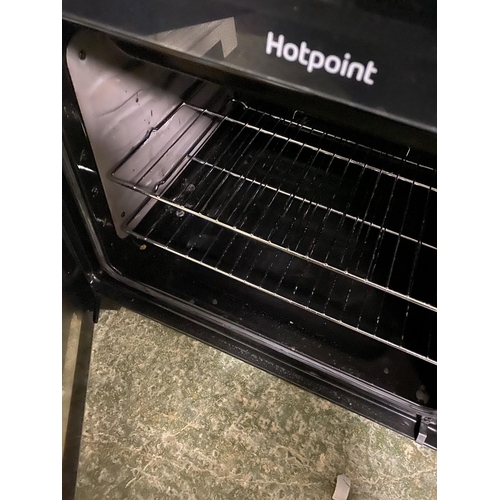 501 - Hotpoint cooker, with paperwork (auctioneer cannot guarantee working order of this lot, it is from a... 