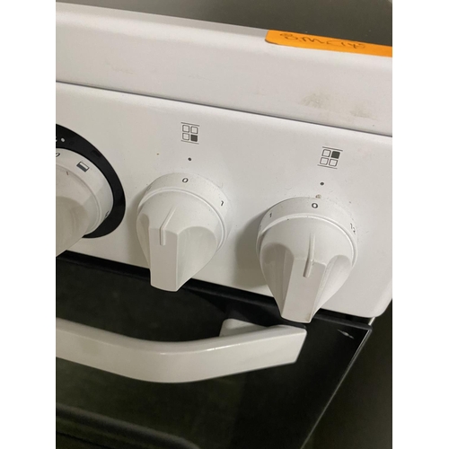 501 - Hotpoint cooker, with paperwork (auctioneer cannot guarantee working order of this lot, it is from a... 