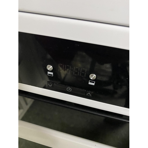 501 - Hotpoint cooker, with paperwork (auctioneer cannot guarantee working order of this lot, it is from a... 