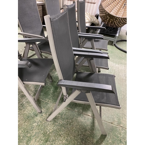 503 - GARDEN FURNITURE: a set of grey and black folding garden chairs