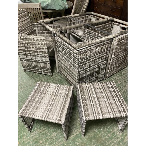 504 - GARDEN FURNITURE: grey faux rattan/all weather garden table and chair cube set, comprising a table w... 