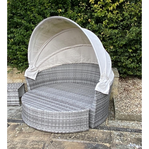 505 - GARDEN FURNITURE: Two similar grey faux rattan/all weather semi circular garden sun sofas and cream ... 