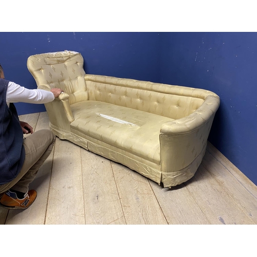 527 - A Victorian bath shaped Chaise Longue , with buttoned arms and back and original ivory silk upholste... 