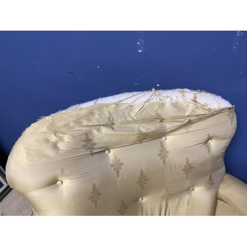 527 - A Victorian bath shaped Chaise Longue , with buttoned arms and back and original ivory silk upholste... 