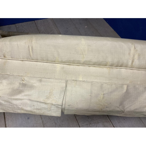 527 - A Victorian bath shaped Chaise Longue , with buttoned arms and back and original ivory silk upholste... 