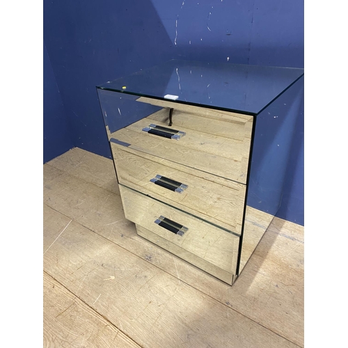 547 - Four pieces of mirrored furniture: pair of 3 drawer mirrored bedside tables, a small narrow 4 drawer... 