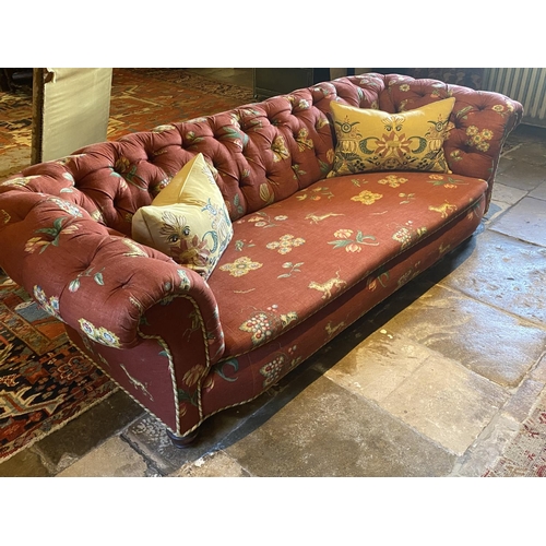 575 - A good Victorian Chesterfield sofa,  in a contemporary terracotta ground upholstery, fully buttoned ... 