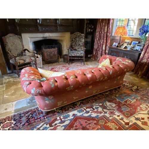 575 - A good Victorian Chesterfield sofa,  in a contemporary terracotta ground upholstery, fully buttoned ... 