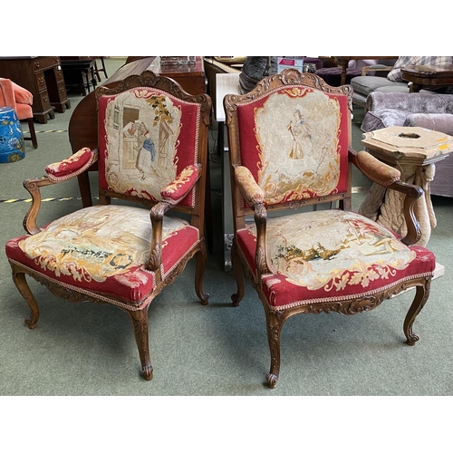 577 - Pair of good French show framed arm chairs, upholstered in a tapestry back seat and arms, on cabriol... 