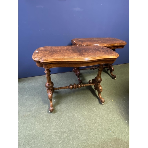 578 - Two very similar Victorian burr walnut fold over serpentine topped card tables, with green baize int... 