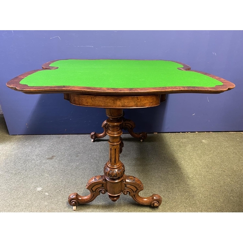 578 - Two very similar Victorian burr walnut fold over serpentine topped card tables, with green baize int... 