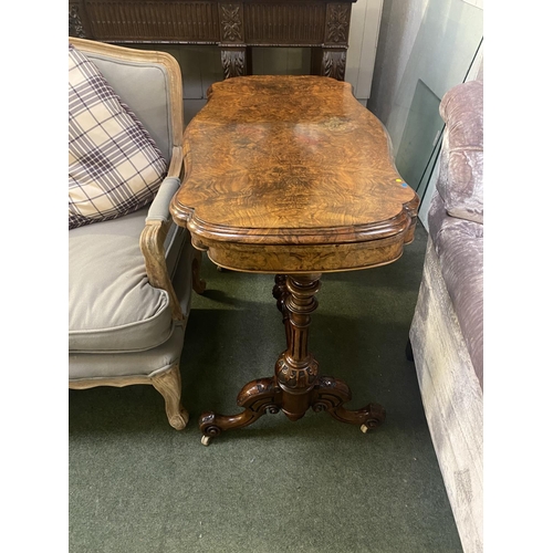 578 - Two very similar Victorian burr walnut fold over serpentine topped card tables, with green baize int... 