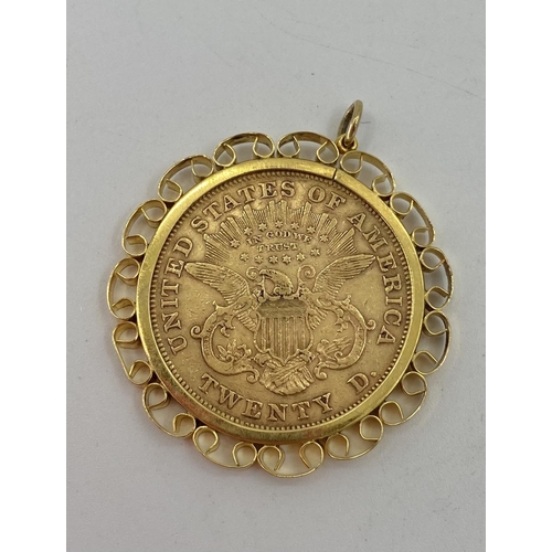 58 - A $20 gold coin 1874 in a 9ct pierced bezel mount 39.32g