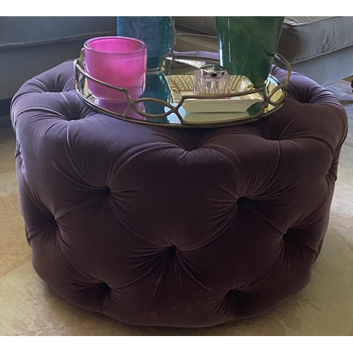 581 - Two Circular buttoned stools, upholstered in a green velvet fabric, and one in a purple  fabric