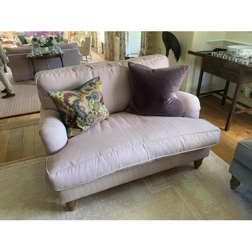 583 - A good two seater sofa, SOFA.COM;  with deep seat and back cushions, upholstered in a light pink/ pu... 