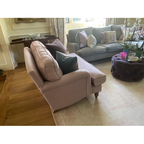 583 - A good two seater sofa, SOFA.COM;  with deep seat and back cushions, upholstered in a light pink/ pu... 