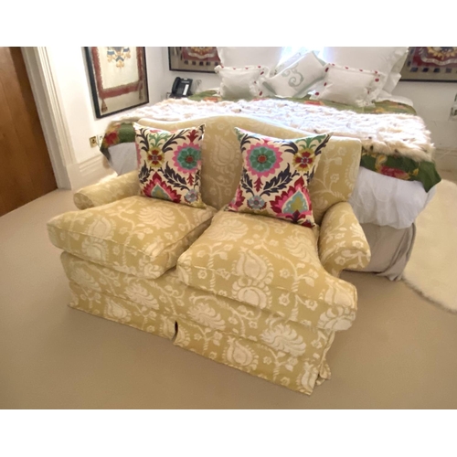 591 - Small traditional two seater sofa, with loose cushions upholstered in a gold and cream patterned fab... 