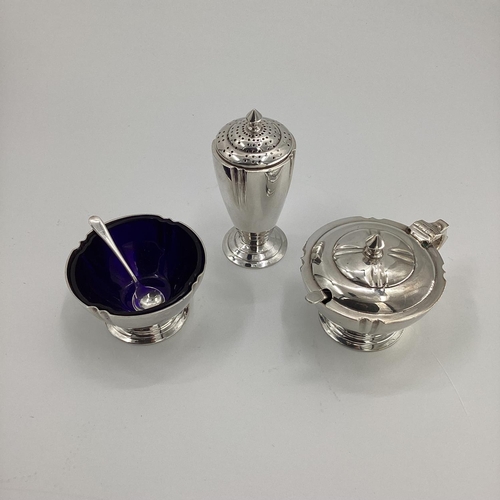 6 - A sterling silver condiment set in the Art Deco style, in fitted box, by Edward Barnard and Son Ltd,... 