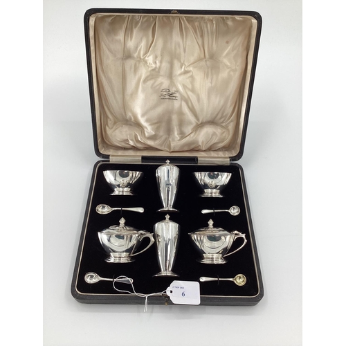 6 - A sterling silver condiment set in the Art Deco style, in fitted box, by Edward Barnard and Son Ltd,... 