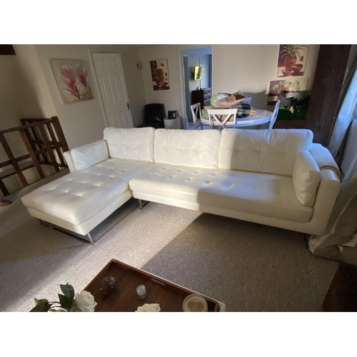 600 - Modern cream Leather L shaped sofa with chrome style legs and matching pouffe and 2 similar modern c... 